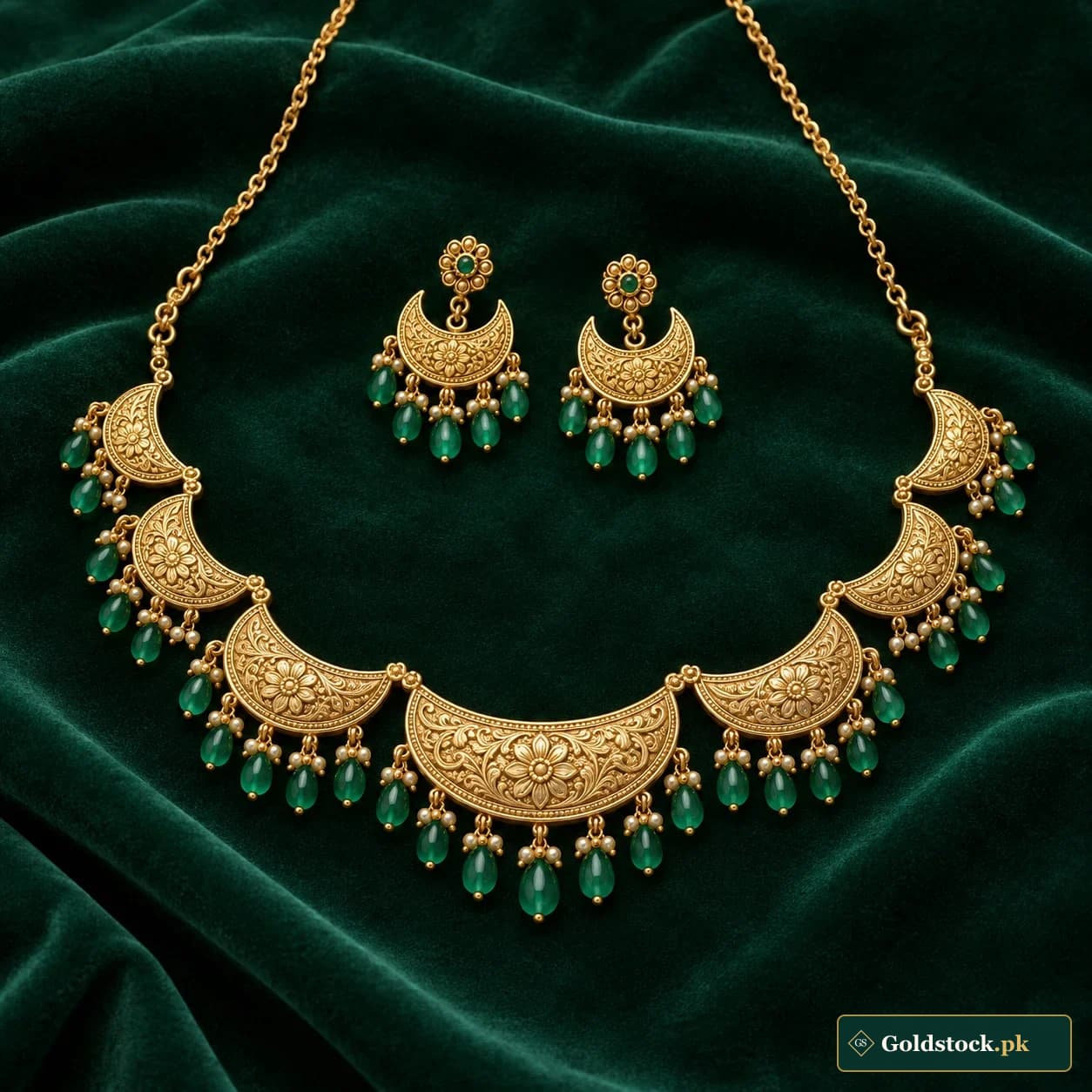 Mahnoor Crescent Gold Set: a matching gold-tone necklace and earrings with graduated crescent-shaped panels