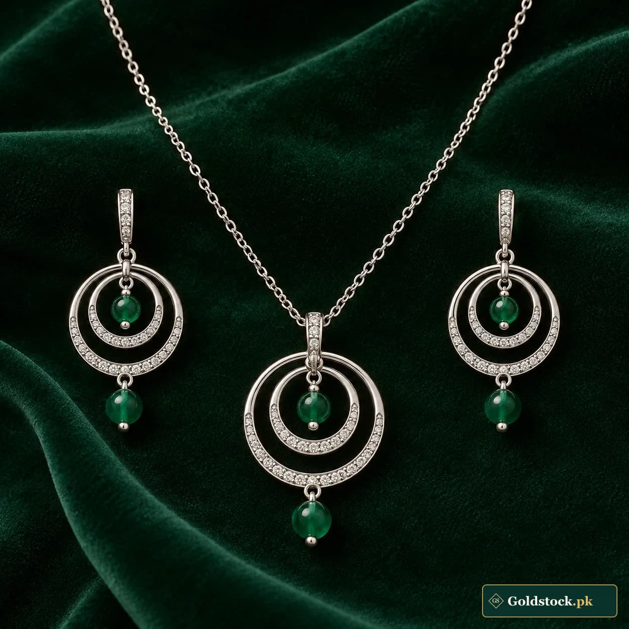 Sitara Orbit Silver Set: a matching silver-tone necklace and earrings with concentric open circles and small suspended beads