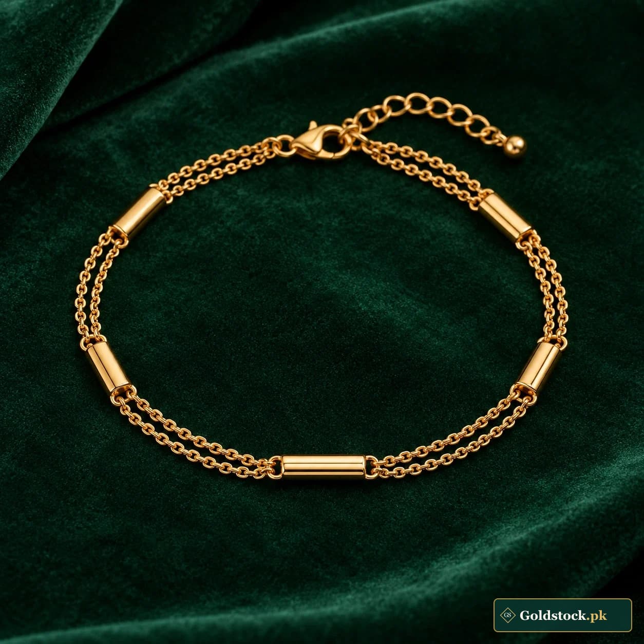 Nadia Ladder Bracelet: a gold-tone bracelet with paired fine chains joined by short polished bars