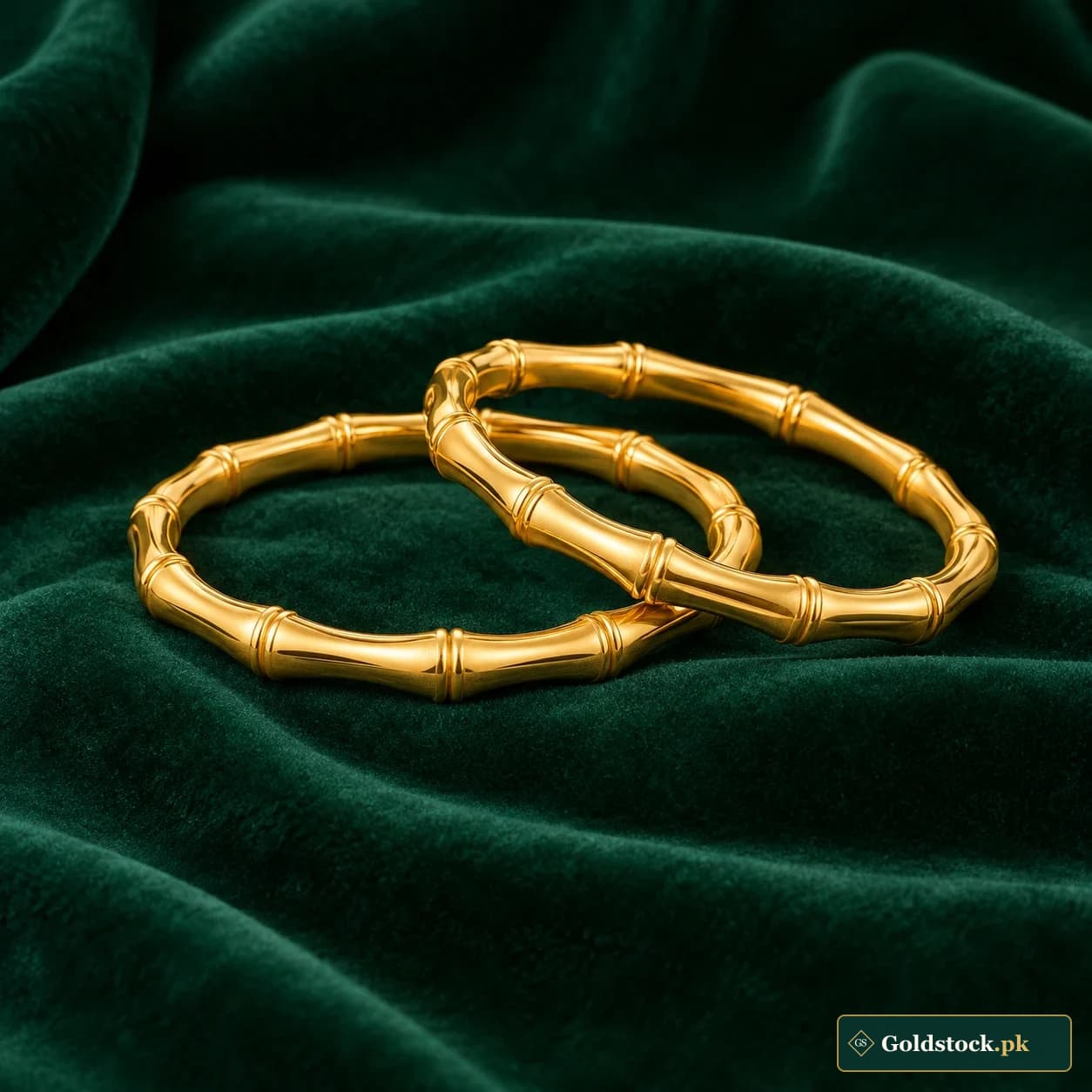 Noreen Bamboo Bangles: a pair of gold-tone bangles with smooth bamboo-joint-inspired segments