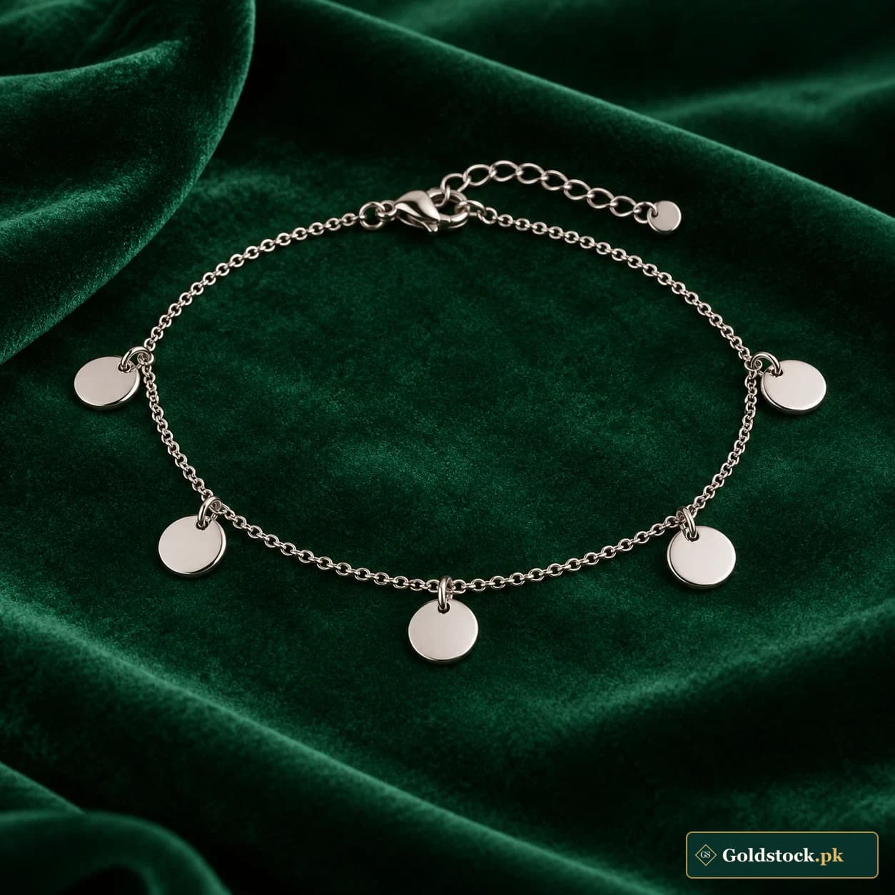 Zimal Disc Bracelet: a silver-tone bracelet with spaced smooth round disc charms on a delicate chain