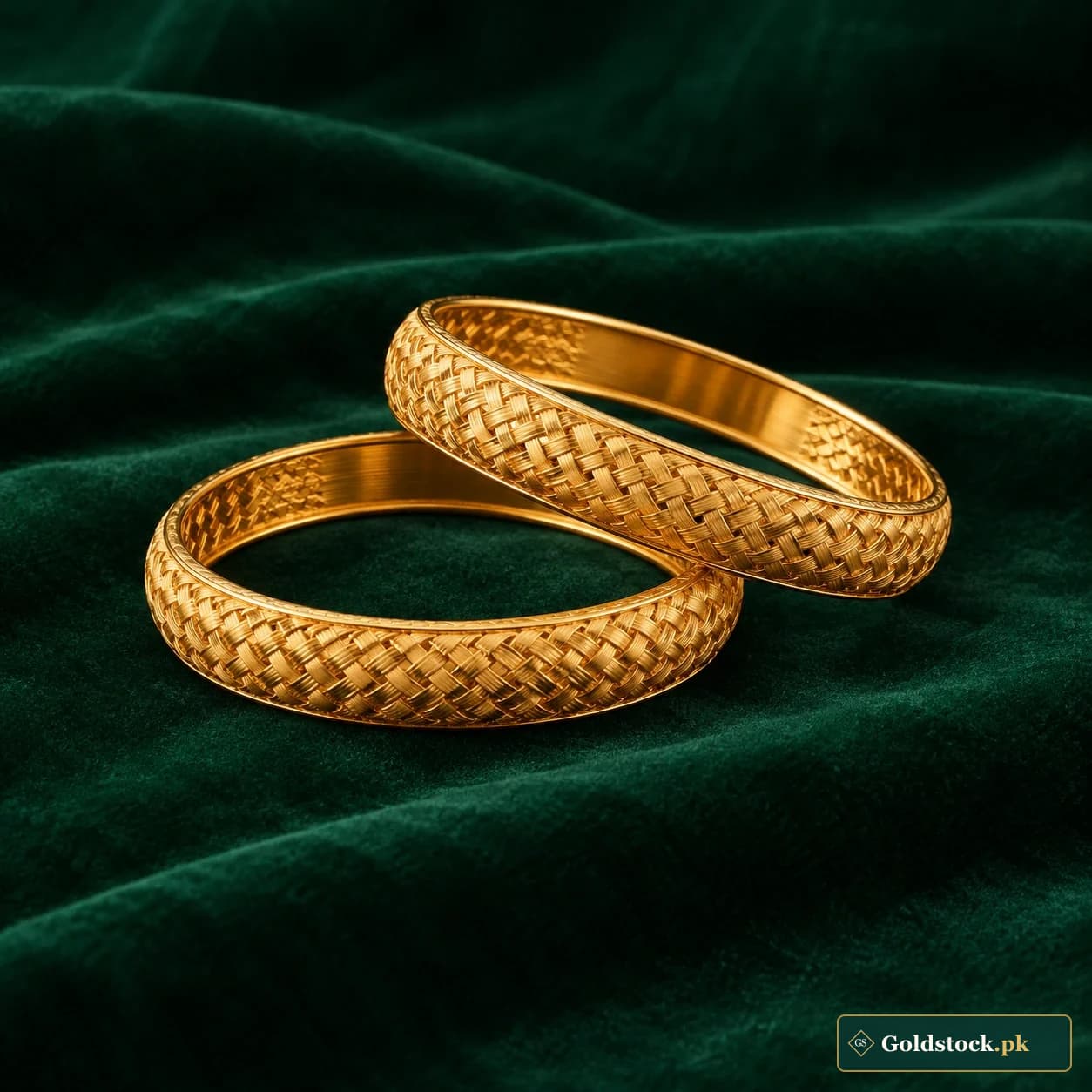 Amani Woven Bangles: a pair of rigid gold-tone bangles with a fine basket-weave surface pattern
