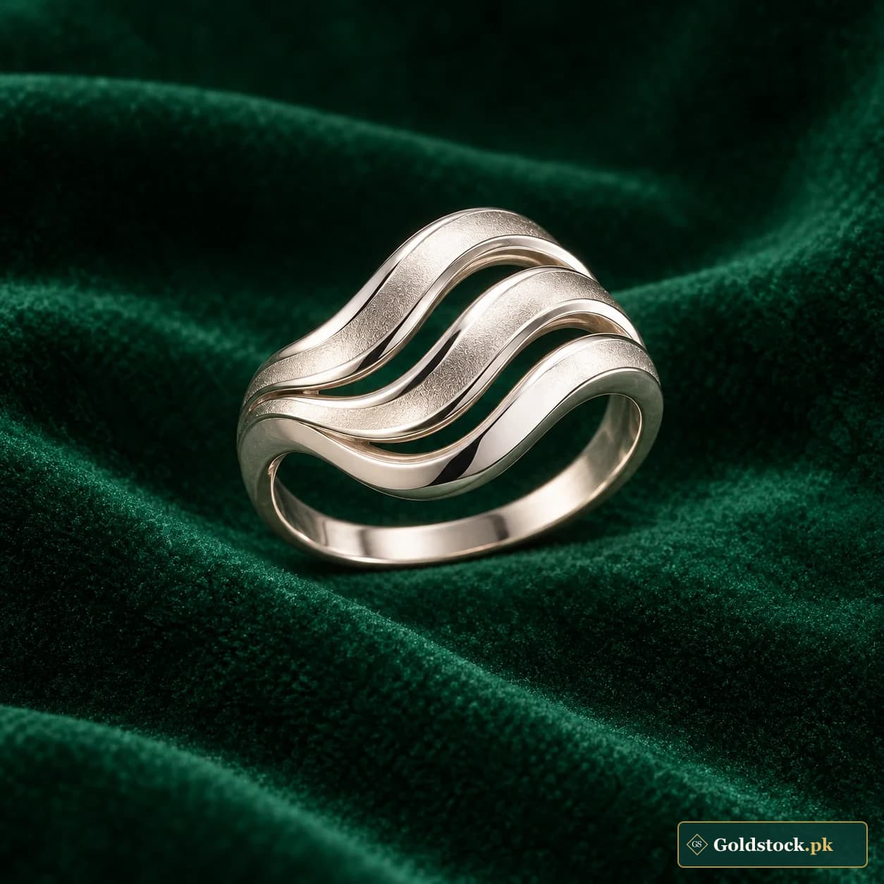 Sahil Wave Ring: a silver-tone ring with three flowing wave-shaped ridges across the face