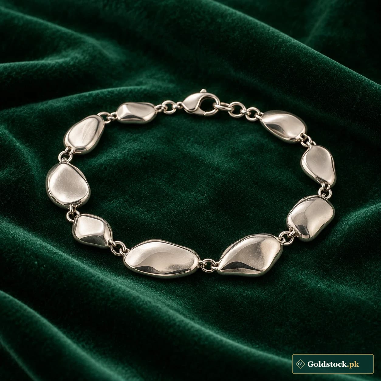 Iffat Pebble Bracelet: a silver-tone bracelet formed from softly rounded irregular pebble links