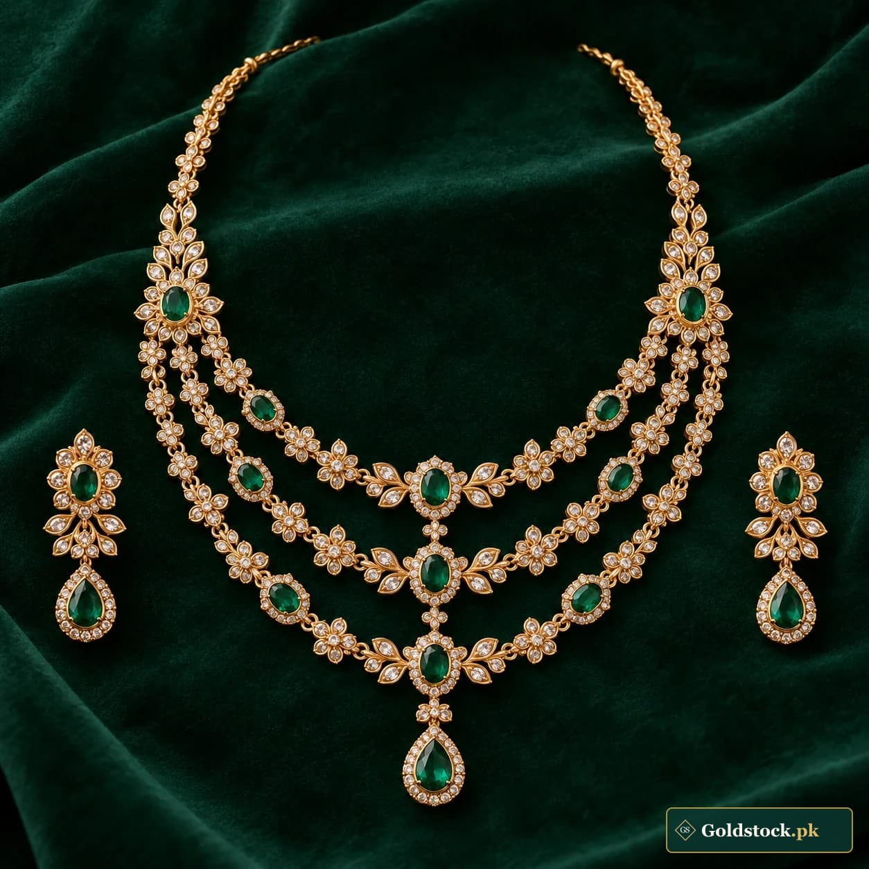 Noorani Tiered Bridal Set: a gold-tone bridal necklace and matching earrings with three tiers of fine floral links