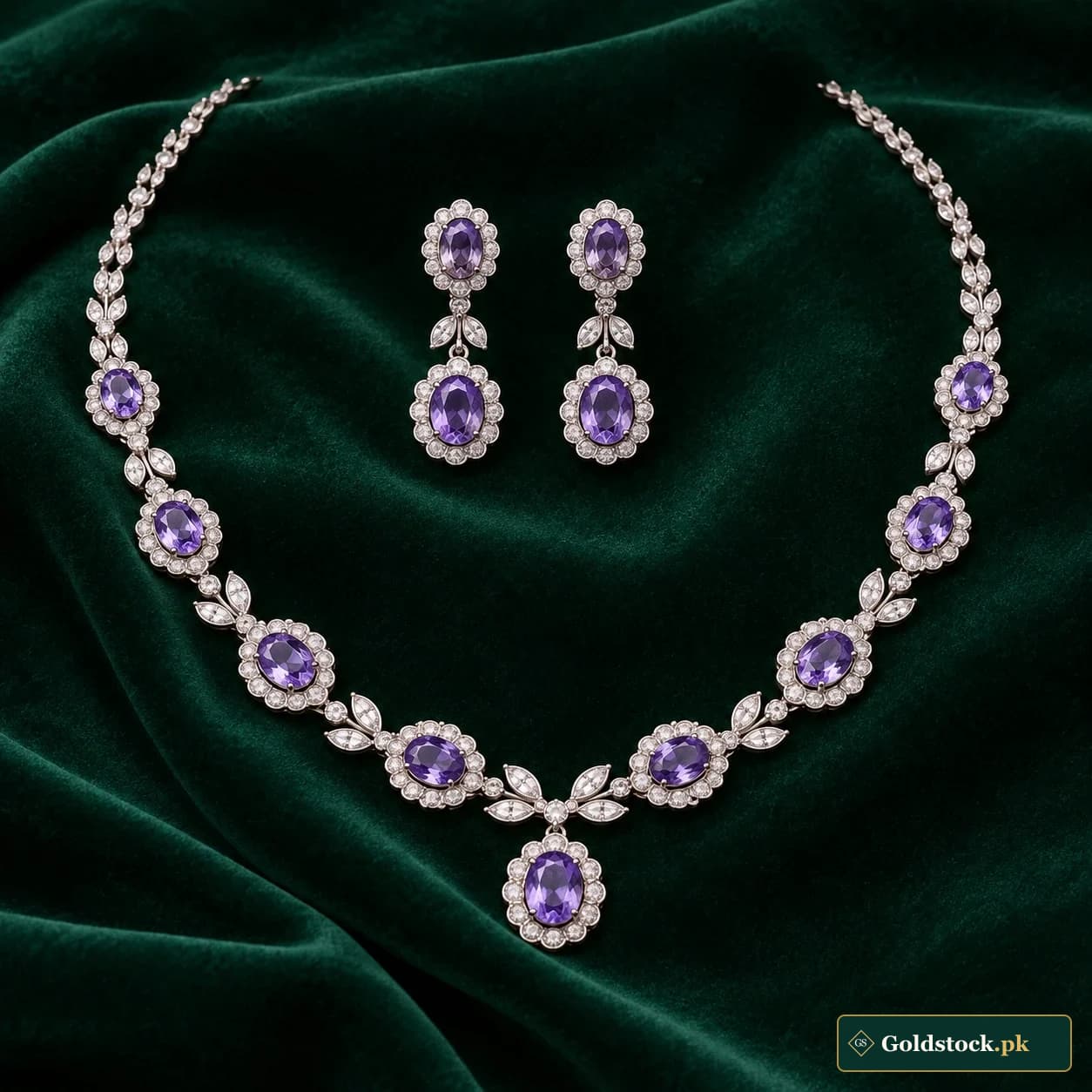 Maira Violet-Accent Silver Set: a matching silver-tone necklace and earrings with violet-coloured oval accents and scalloped surrounds