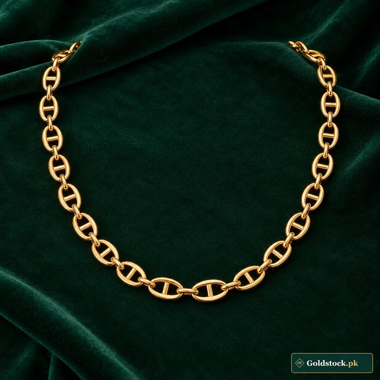 Roshana Mariner Chain: an unadorned gold-tone neck chain with oval links crossed by central bars