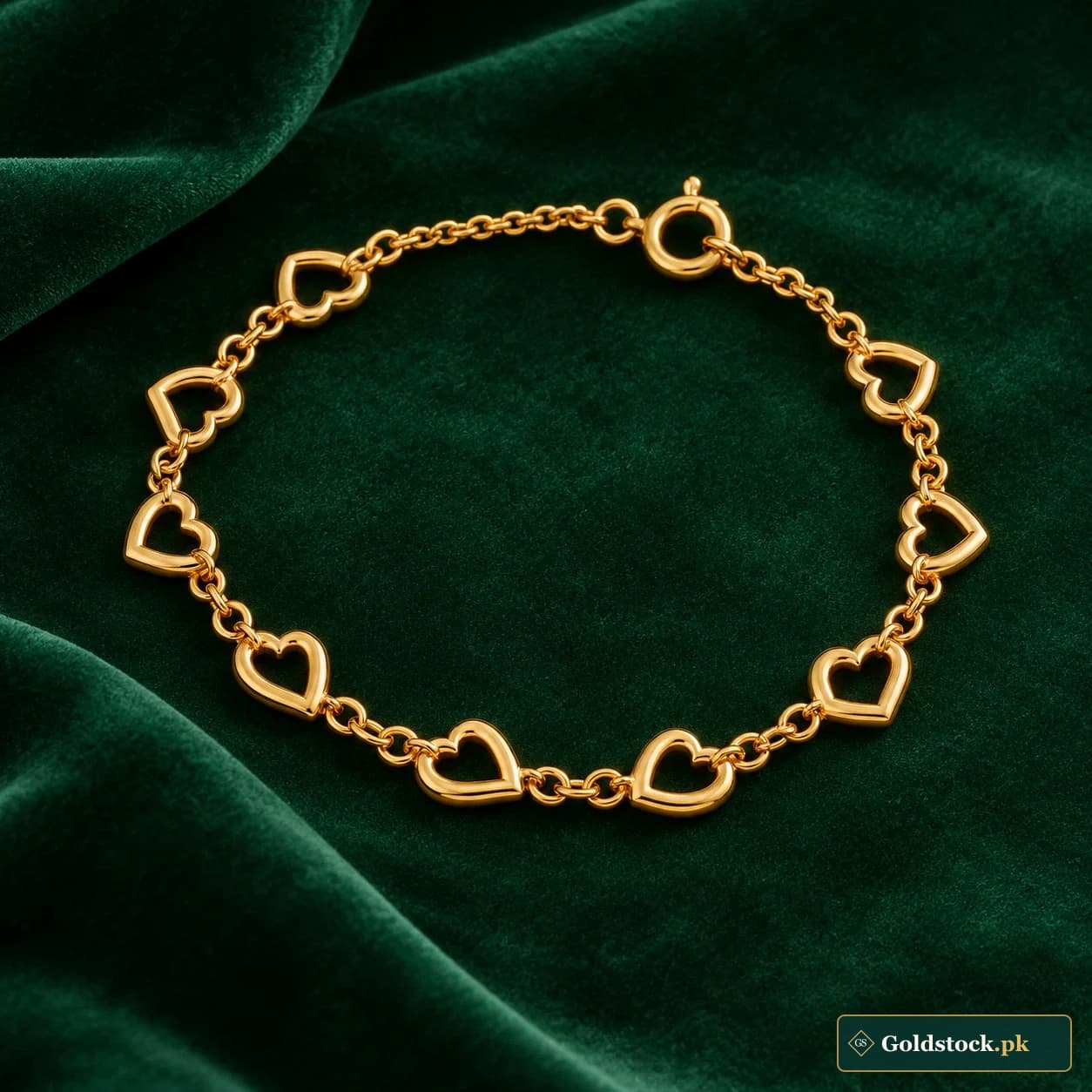 Fariha Heart-Link Bracelet: a gold-tone bracelet with linked open heart shapes and a small round clasp