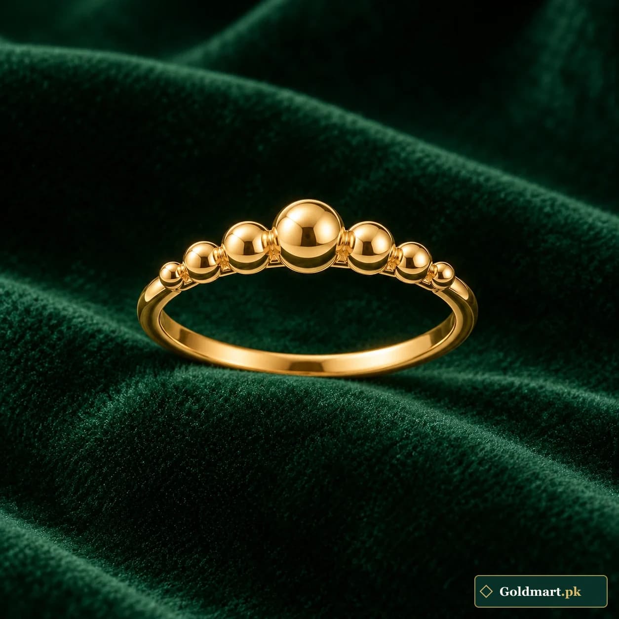 Nimra Bead Crown Ring: a gold-tone ring with a crown-like row of graduated polished beads