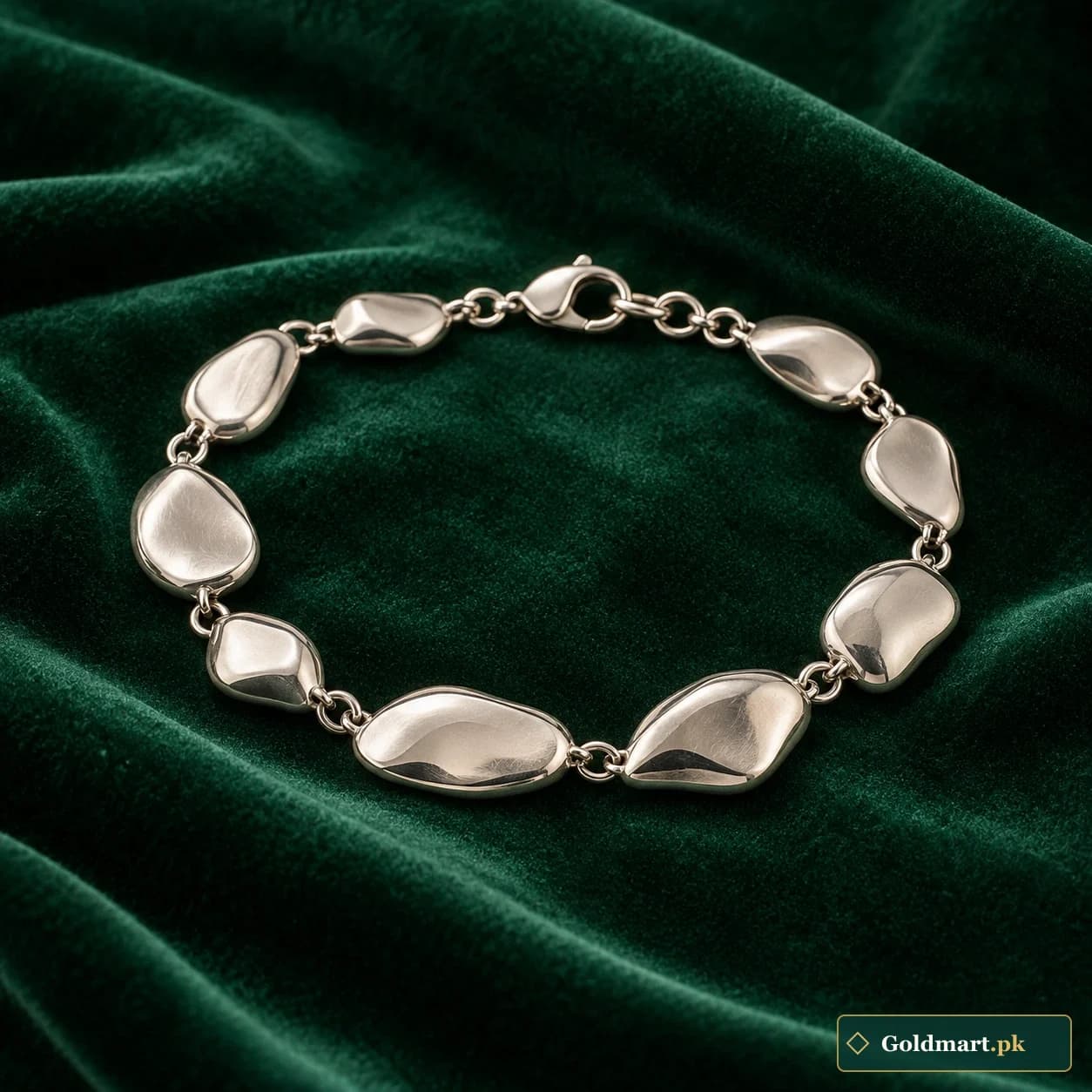 Iffat Pebble Bracelet: a silver-tone bracelet formed from softly rounded irregular pebble links