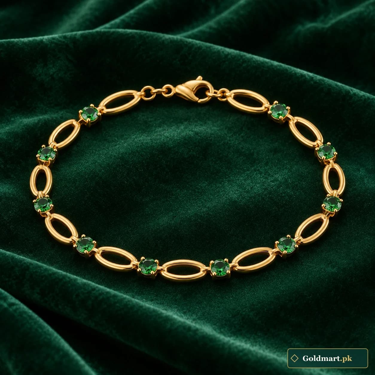 Hoor Green-Accent Bracelet: a gold-tone bracelet with small green decorative accents alternating with open oval links